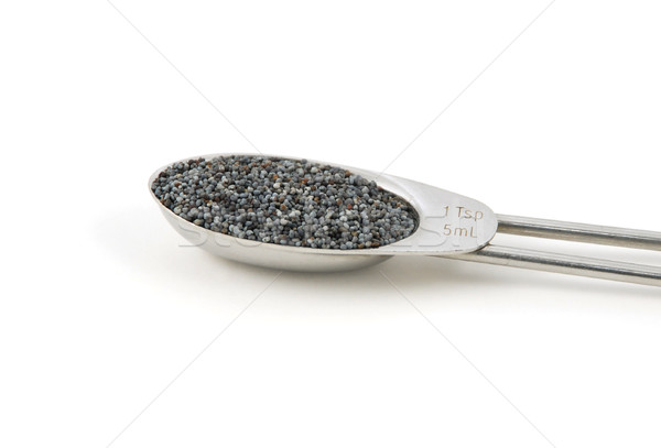 Poppy seeds measured in a metal teaspoon Stock photo © sarahdoow