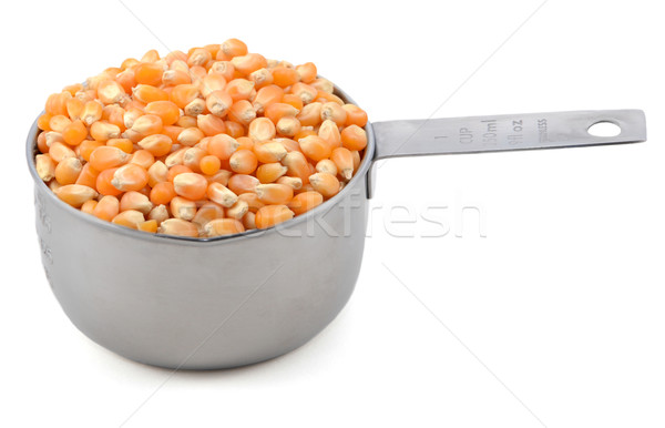 Popcorn maize in an American cup measure Stock photo © sarahdoow