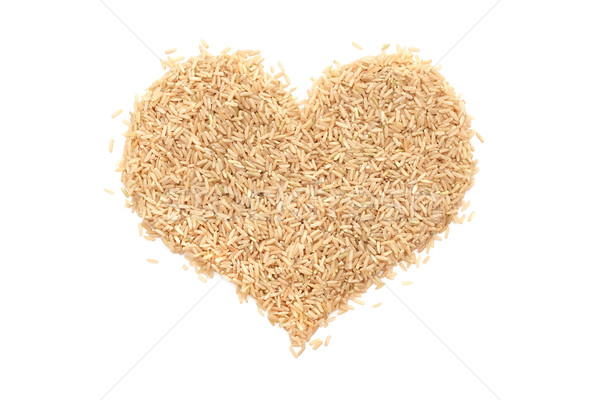 Long grain brown rice in a heart shape Stock photo © sarahdoow