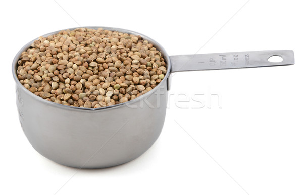 Hemp seeds in a measuring cup Stock photo © sarahdoow