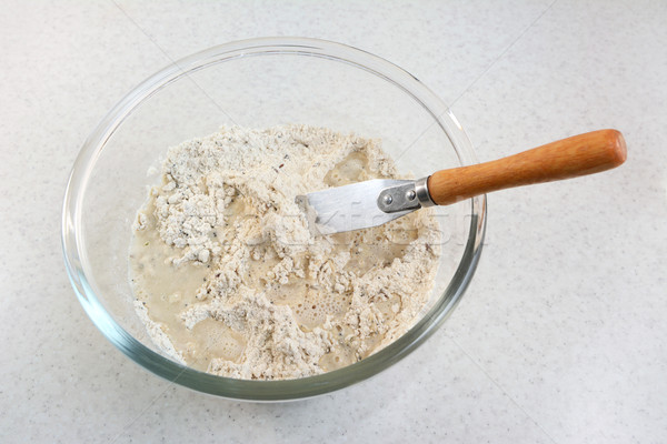 Mixing water and bread flour mix Stock photo © sarahdoow
