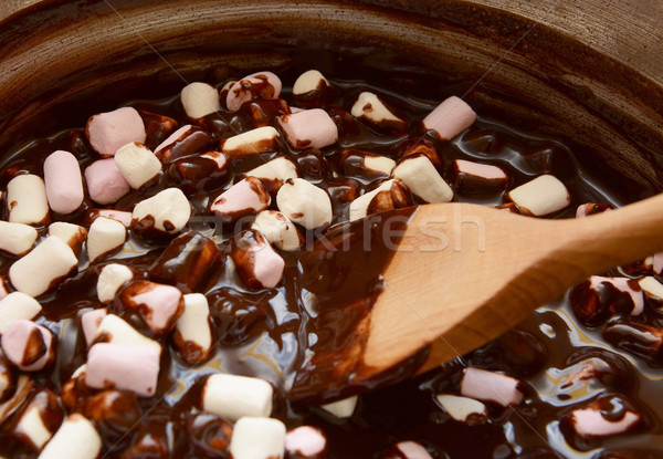 Mixing mini marshmallows into dark chocolate Stock photo © sarahdoow