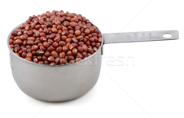 Adzuki, azuki or aduki beans in an American cup measure Stock photo © sarahdoow