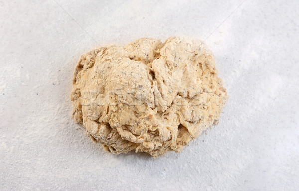 Rough ball of bread dough on a floured work surface Stock photo © sarahdoow
