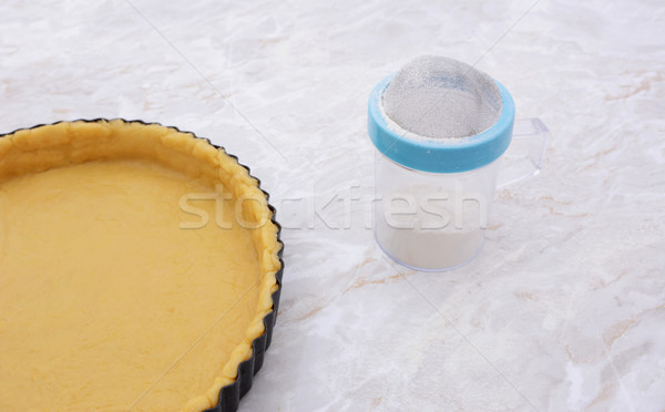 Pastry-lined tin and flour drifter Stock photo © sarahdoow