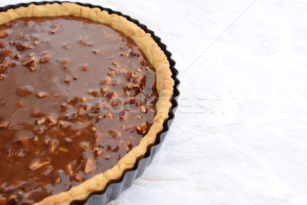 Stock photo: Pastry case filled with nutty pecan pie filling