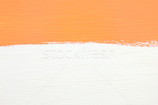 Stripe of orange paint over white wooden background Stock photo © sarahdoow