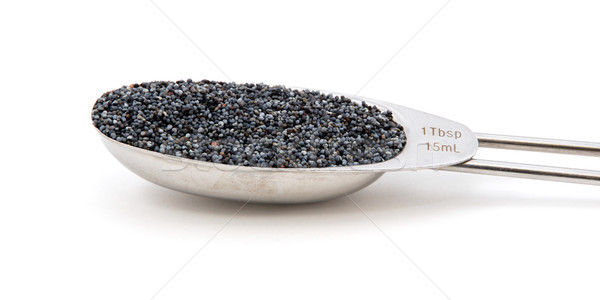 Poppy seeds measured in a metal tablespoon Stock photo © sarahdoow