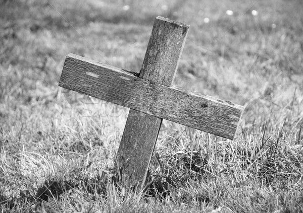 Wooden cross marking a grave Stock photo © sarahdoow