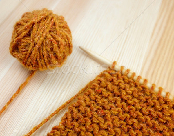 Closeup of garter stitch knitting and orange wool Stock photo © sarahdoow
