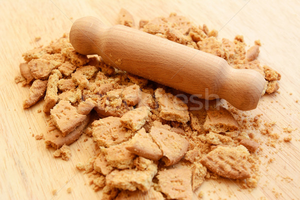 Crushing digestive biscuits with a rolling pin Stock photo © sarahdoow