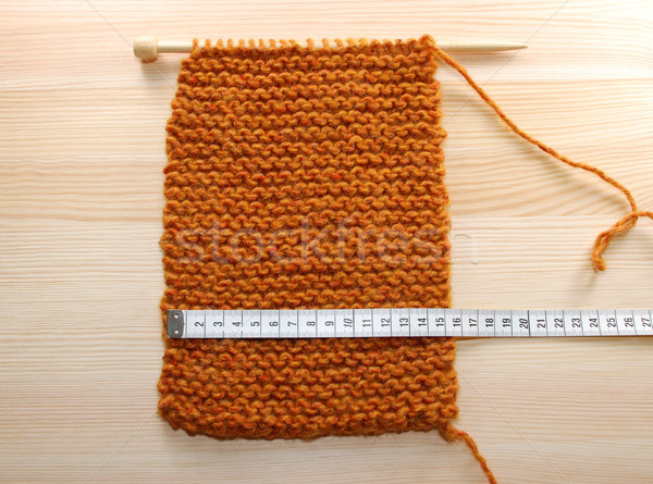 A length of knitting being measured in centimetres Stock photo © sarahdoow