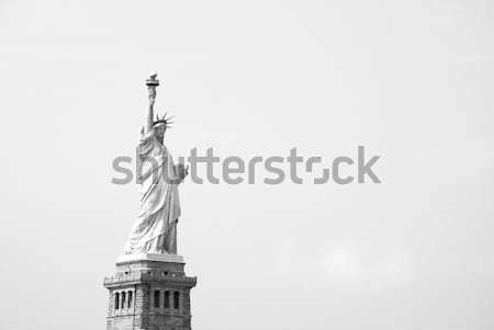 Stock photo: The Statue of Liberty against a blue sky