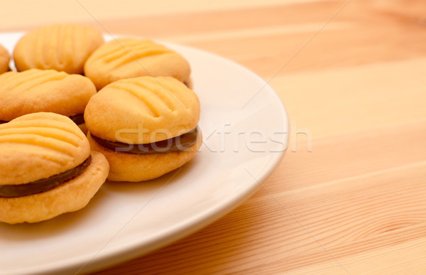 Stock photo: Plate of chocolate-filled cookies