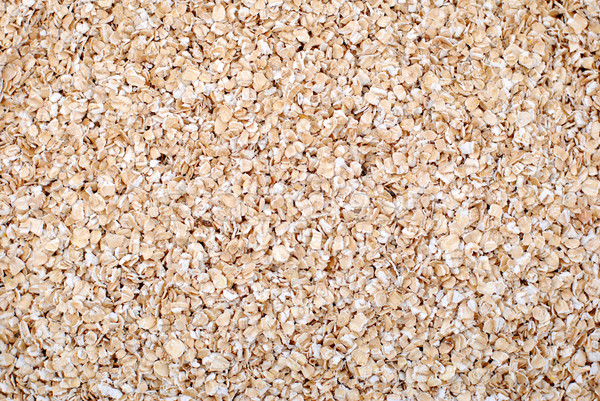 Porridge oats or oatmeal background Stock photo © sarahdoow