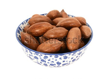 Pecan nuts in a blue and white china bowl Stock photo © sarahdoow