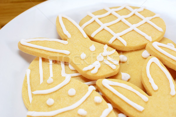 Stock photo: Close up of frosted Easter cookies on a plate