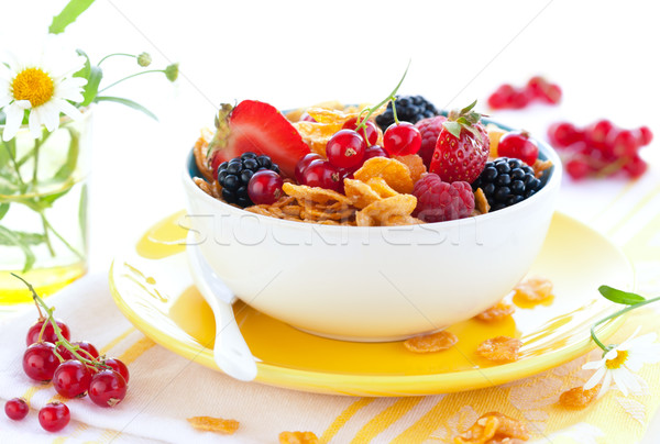Stock photo: corn flakes with fruits  and milk 