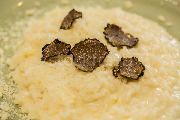 Italian risotto with black truffle Stock photo © sarymsakov