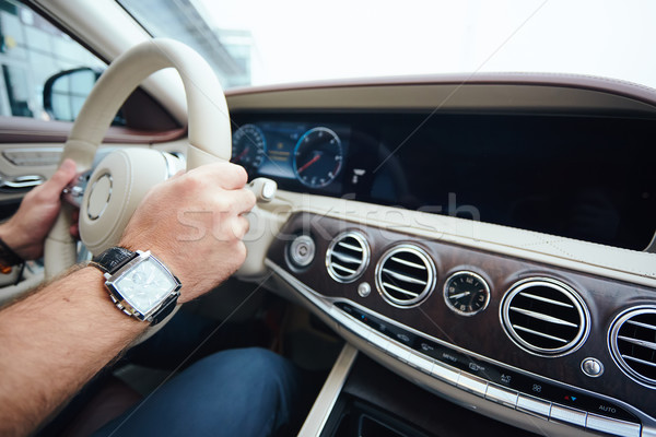 Man sitting and driving in the car. Stock photo © sarymsakov