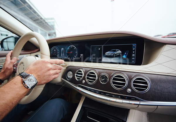 Man sitting and driving in the car. Stock photo © sarymsakov