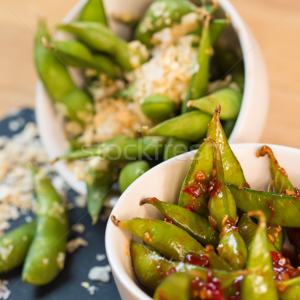 Green string beans chinese dish with spices Stock photo © sarymsakov