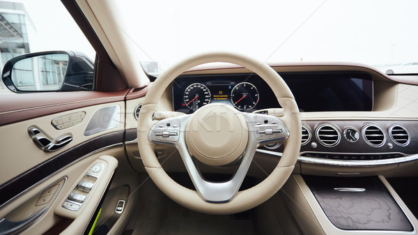 Car interior luxury. Interior of prestige modern car. Leather comfortable seats, dashboard and steer Stock photo © sarymsakov