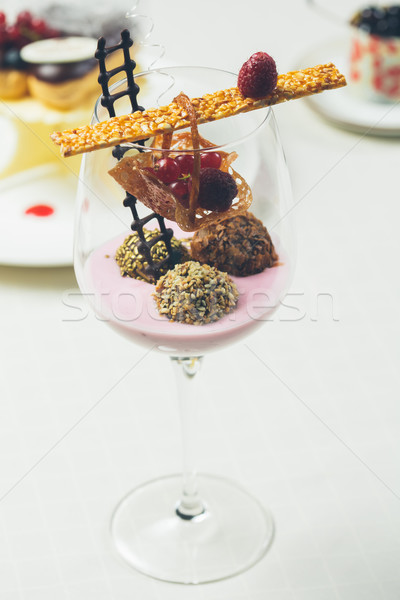Close up of chocolate truffles in elegant glasses Stock photo © sarymsakov