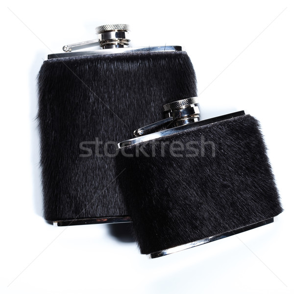 Stock photo: Metal flasks for alcoholic beverages on white.