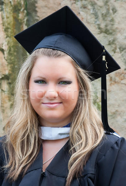 Stock photo: Female College Graduate in Cap and Gown