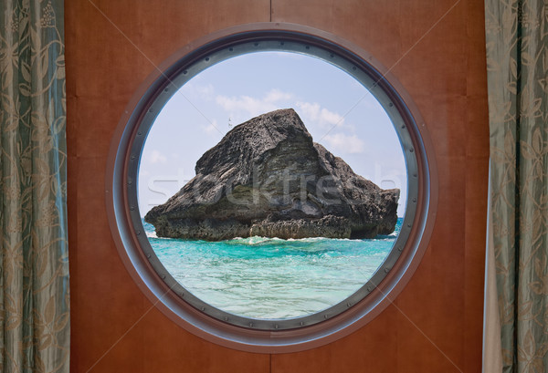 Rock in Ocean through Porthole Stock photo © sbonk