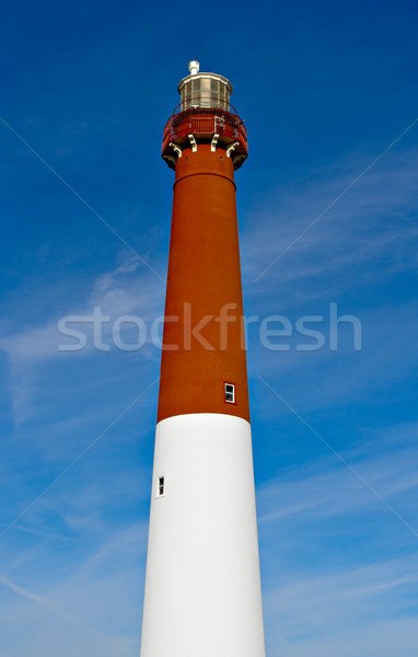 Leuchtturm rot weiß blauer Himmel Himmel Haus Stock foto © sbonk