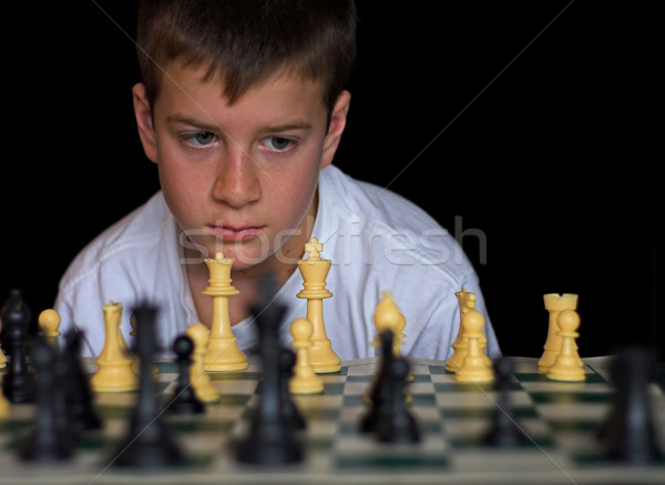 Boy Playing Chess Stock photo © sbonk