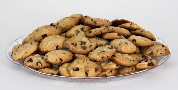 Fach Schokolade Chip Cookies isoliert weiß Stock foto © sbonk