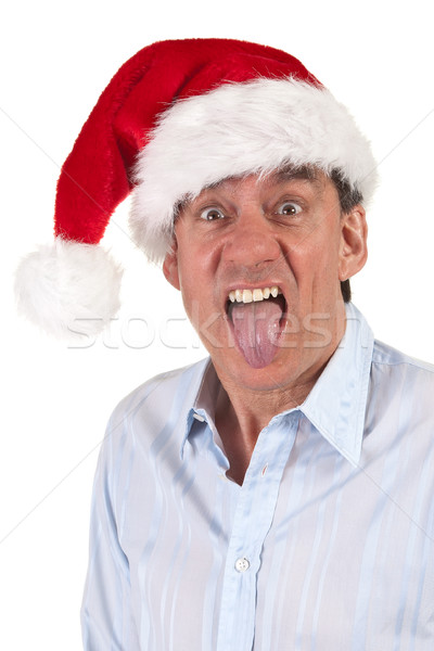 Headshot of Business Man in Santa Hat Sticking Out Tongue Stock photo © scheriton