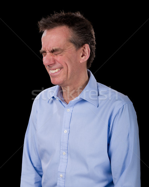 Business Man Eyes Screwed up in Horrified Reaction Stock photo © scheriton
