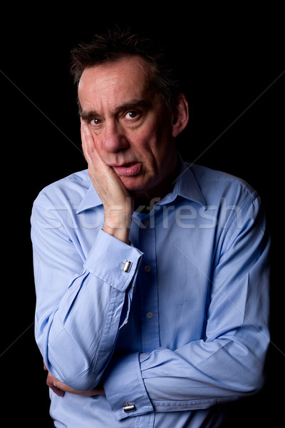 Sad Anxious Depressed Business Man with Hand to Chin Stock photo © scheriton