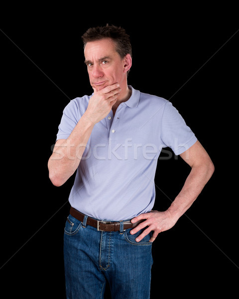 Thoughtful Man Considering Something Hand on Hip Stock photo © scheriton