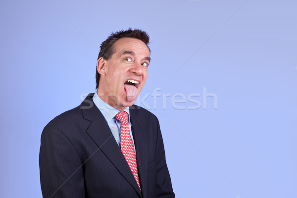 Business Man in Suit Sticking Out Tongue Stock photo © scheriton