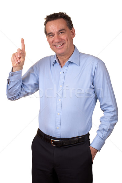 Smiling Business Man Pointing Upwards Stock photo © scheriton