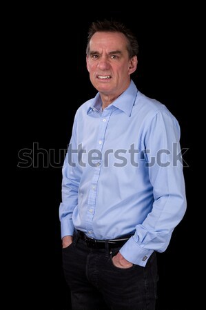 Angry Frowning Scowling Business Man Hands in Pockets Stock photo © scheriton
