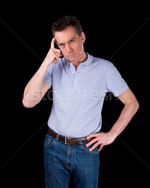 Stock photo: Frowning Confused Man Scratching Head in Thought