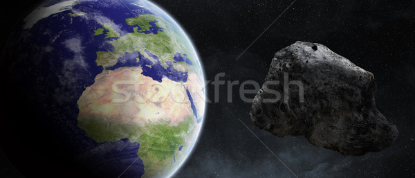 Amenintare Planet Earth care zboară aproape soare lume Imagine de stoc © sdecoret