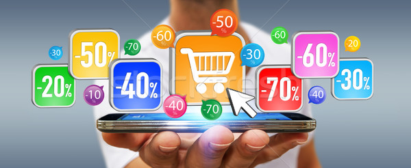 Young man shopping during sales period Stock photo © sdecoret