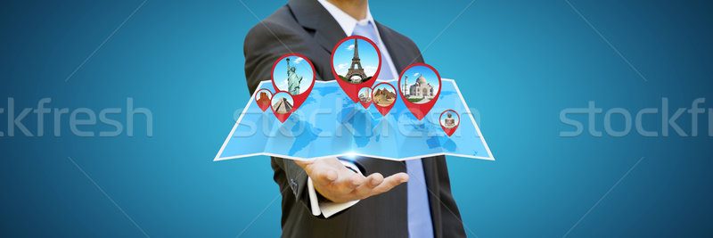 Businessman holding digital map in his hands Stock photo © sdecoret