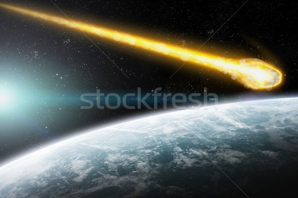 Asteroids over planet earth Stock photo © sdecoret