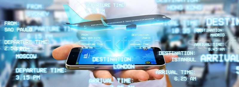 бизнесмен полет современных мобильного телефона книга Сток-фото © sdecoret