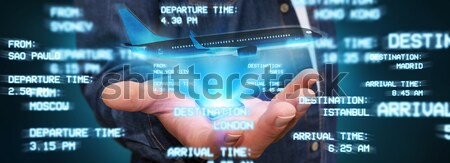 Businessman booking his flight Stock photo © sdecoret