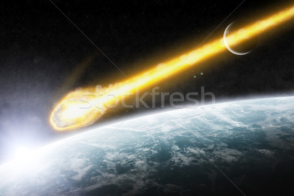 Asteroids over planet earth Stock photo © sdecoret