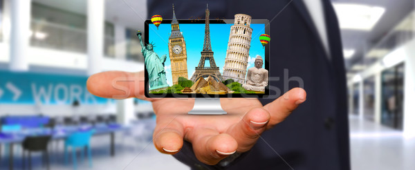 Man travelling the world with his computer Stock photo © sdecoret